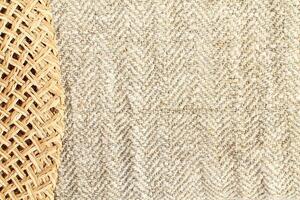 Natural Linen Material Textile Canvas Fabric Texture Background Close-up Detail of Fabric Natural Color Hemp Material Pattern Design Wallpaper. Can be Used as Background or For Graphic Design photo