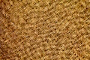 Natural Linen Material Textile Canvas Fabric Texture Background Close-up Detail of Fabric Natural Color Hemp Material Pattern Design Wallpaper. Can be Used as Background or For Graphic Design photo