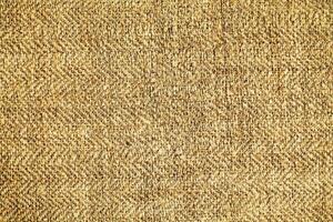 Natural Linen Material Textile Canvas Fabric Texture Background Close-up Detail of Fabric Natural Color Hemp Material Pattern Design Wallpaper. Can be Used as Background or For Graphic Design photo