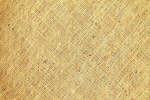 Natural Linen Material Textile Canvas Fabric Texture Background Close-up Detail of Fabric Natural Color Hemp Material Pattern Design Wallpaper. Can be Used as Background or For Graphic Design photo