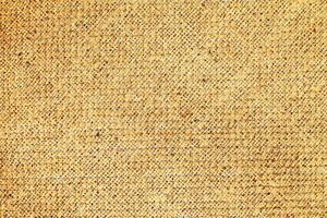 Natural Linen Material Textile Canvas Fabric Texture Background Close-up Detail of Fabric Natural Color Hemp Material Pattern Design Wallpaper. Can be Used as Background or For Graphic Design photo