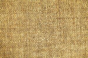 Natural Linen Material Textile Canvas Fabric Texture Background Close-up Detail of Fabric Natural Color Hemp Material Pattern Design Wallpaper. Can be Used as Background or For Graphic Design photo