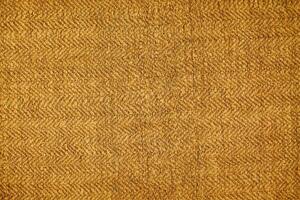 Natural Linen Material Textile Canvas Fabric Texture Background Close-up Detail of Fabric Natural Color Hemp Material Pattern Design Wallpaper. Can be Used as Background or For Graphic Design photo