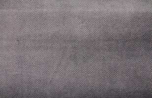 Natural Linen Material Textile Canvas Fabric Texture Background Close-up Detail of Fabric Natural Color Hemp Material Pattern Design Wallpaper. Can be Used as Background or For Graphic Design photo
