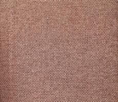 Natural Linen Material Textile Canvas Fabric Texture Background Close-up Detail of Fabric Natural Color Hemp Material Pattern Design Wallpaper. Can be Used as Background or For Graphic Design photo