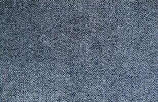 Natural Linen Material Textile Canvas Fabric Texture Background Close-up Detail of Fabric Natural Color Hemp Material Pattern Design Wallpaper. Can be Used as Background or For Graphic Design photo