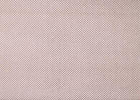 Natural Linen Material Textile Canvas Fabric Texture Background Close-up Detail of Fabric Natural Color Hemp Material Pattern Design Wallpaper. Can be Used as Background or For Graphic Design photo