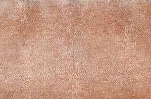 Natural Linen Material Textile Canvas Fabric Texture Background Close-up Detail of Fabric Natural Color Hemp Material Pattern Design Wallpaper. Can be Used as Background or For Graphic Design photo