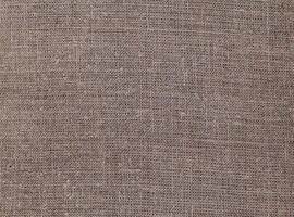 Natural Linen Material Textile Canvas Fabric Texture Background Close-up Detail of Fabric Natural Color Hemp Material Pattern Design Wallpaper. Can be Used as Background or For Graphic Design photo