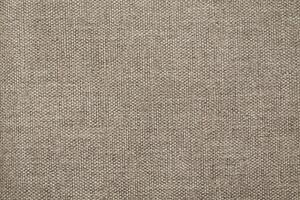 Natural Linen Material Textile Canvas Fabric Texture Background Close-up Detail of Fabric Natural Color Hemp Material Pattern Design Wallpaper. Can be Used as Background or For Graphic Design photo