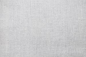 Natural Linen Material Textile Canvas Fabric Texture Background Close-up Detail of Fabric Natural Color Hemp Material Pattern Design Wallpaper. Can be Used as Background or For Graphic Design photo
