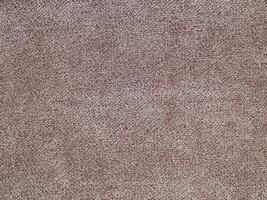 Natural Linen Material Textile Canvas Fabric Texture Background Close-up Detail of Fabric Natural Color Hemp Material Pattern Design Wallpaper. Can be Used as Background or For Graphic Design photo