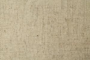 Natural Linen Material Textile Canvas Fabric Texture Background Close-up Detail of Fabric Natural Color Hemp Material Pattern Design Wallpaper. Can be Used as Background or For Graphic Design photo