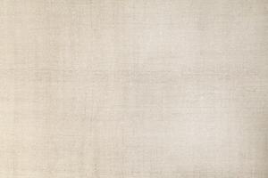 Natural Linen Material Textile Canvas Fabric Texture Background Close-up Detail of Fabric Natural Color Hemp Material Pattern Design Wallpaper. Can be Used as Background or For Graphic Design photo