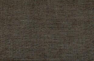 Natural Linen Material Textile Canvas Fabric Texture Background Close-up Detail of Fabric Natural Color Hemp Material Pattern Design Wallpaper. Can be Used as Background or For Graphic Design photo