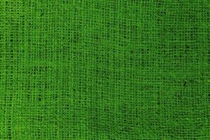 Natural Linen Material Textile Canvas Fabric Texture Background Close-up Detail of Fabric Natural Color Hemp Material Pattern Design Wallpaper. Can be Used as Background or For Graphic Design photo