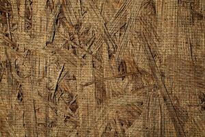 Natural Linen Material Textile Canvas Fabric Texture Background Close-up Detail of Fabric Natural Color Hemp Material Pattern Design Wallpaper. Can be Used as Background or For Graphic Design photo