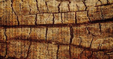 Natural Linen Material Textile Canvas Fabric Texture Background Close-up Detail of Fabric Natural Color Hemp Material Pattern Design Wallpaper. Can be Used as Background or For Graphic Design photo