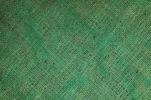 Natural Linen Material Textile Canvas Fabric Texture Background Close-up Detail of Fabric Natural Color Hemp Material Pattern Design Wallpaper. Can be Used as Background or For Graphic Design photo