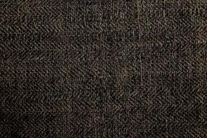 Natural Linen Material Textile Canvas Fabric Texture Background Close-up Detail of Fabric Natural Color Hemp Material Pattern Design Wallpaper. Can be Used as Background or For Graphic Design photo
