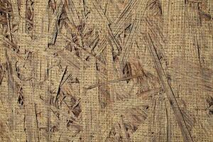 Natural Linen Material Textile Canvas Fabric Texture Background Close-up Detail of Fabric Natural Color Hemp Material Pattern Design Wallpaper. Can be Used as Background or For Graphic Design photo
