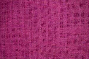 Natural Linen Material Textile Canvas Fabric Texture Background Close-up Detail of Fabric Natural Color Hemp Material Pattern Design Wallpaper. Can be Used as Background or For Graphic Design photo