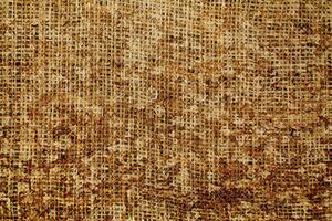 Natural Linen Material Textile Canvas Fabric Texture Background Close-up Detail of Fabric Natural Color Hemp Material Pattern Design Wallpaper. Can be Used as Background or For Graphic Design photo