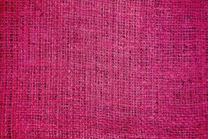 Natural Linen Material Textile Canvas Fabric Texture Background Close-up Detail of Fabric Natural Color Hemp Material Pattern Design Wallpaper. Can be Used as Background or For Graphic Design photo