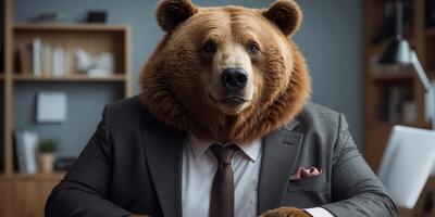 Fat brown bear with strict expression of muzzle in suit and tie is sitting in office in his cabinet at desk in place of boss. photo