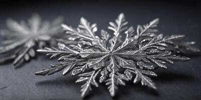 Slate gray background with snowflake designs. photo