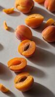 Fresh halved apricots with kernel cut out. photo