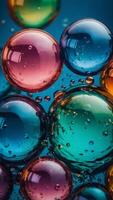 Abstract colorful bubbles on blue background. photo
