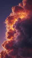 A purple and orange cloud with fire shooting out of it. photo