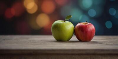 Three apples of different colors are displayed on a table. photo