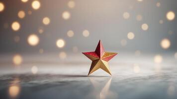A white piece of paper with a red and gold star on it. photo