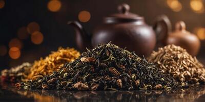 Four different types of tea are piled on top of each other. photo
