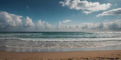 A sandy beach with a cloudy sky in the background. photo