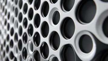 A close look at another vent reveals a unique honeycomblike design made from a combination of black and white plastic for a bold and contemporary look photo
