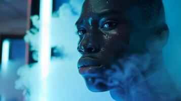 A young athlete stands inside the cryotherapy machine preparing for a game by using the treatment to boost their performance and reduce inflammation photo