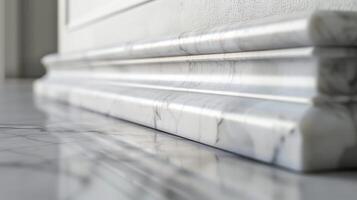 A zoomedin view of a minimalistic interior trim made of white marble showcasing its intricate ing and smooth surface photo