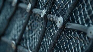 The edges of the cargo net are lined with metal grommets providing additional reinforcement and durability. Each grommet is carefully aligned to ensure maximum strength photo