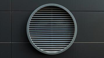 Moving on we see a vent with a circular shape and a ribbed texture adding a sense of depth and dimension to the otherwise simple design photo