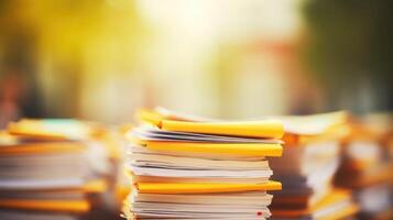Closeup of a stack of filledout volunteer forms, symbolizing the commitment and dedication of volunteers in a community service project. photo