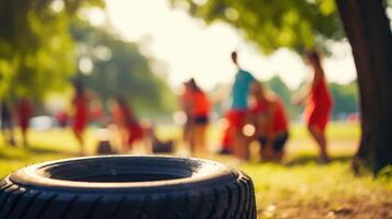 Closeup of a tire repaired and painted by a group of volunteers at a local sports camp. photo