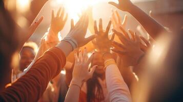 Closeup of a diverse group of hands highfiving after a successful game. photo