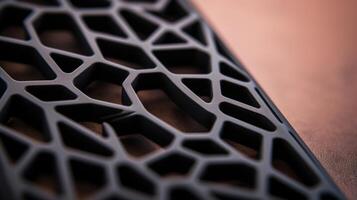 Closeup of a 3D printed phone case, featuring a unique lattice design and a smooth finish. photo
