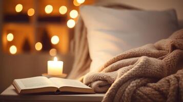 Closeup of a cozy reading nook, filled with plush pillows and a warm blanket, inviting guests to curl up with a book and unwind. photo