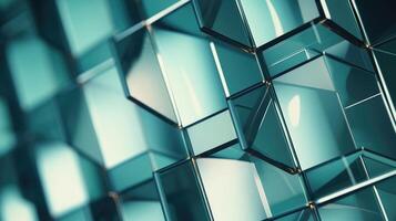 Closeup of a geometric pattern of glass panels on the side of a futuristic highrise. photo