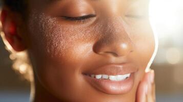 Closeup of a woman with textured skin using a gentle exfoliating scrub to reveal a glowing complexion. photo