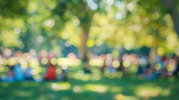 A soft blur of colors and shapes merge into the perfect picnic concert atmosphere photo